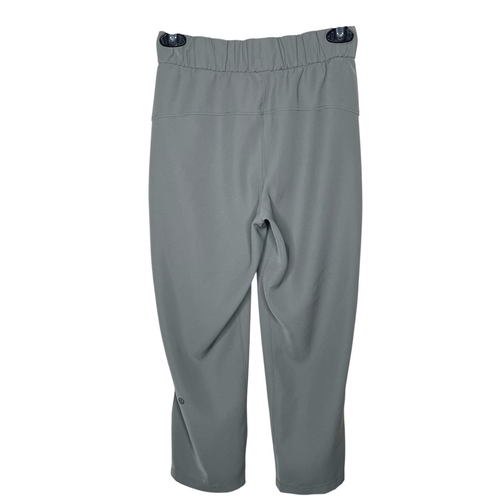 lululemon On The Fly Crop *Woven 23” Grey Sage Sz 2 - Picture 7 of 15